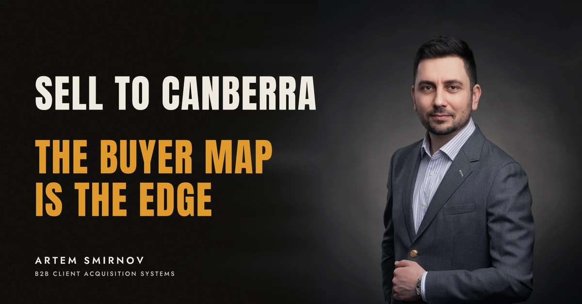 Artem Smirnov in a dark suit against a charcoal studio backdrop, next to the line 'SELL TO CANBERRA. The buyer map is the edge'