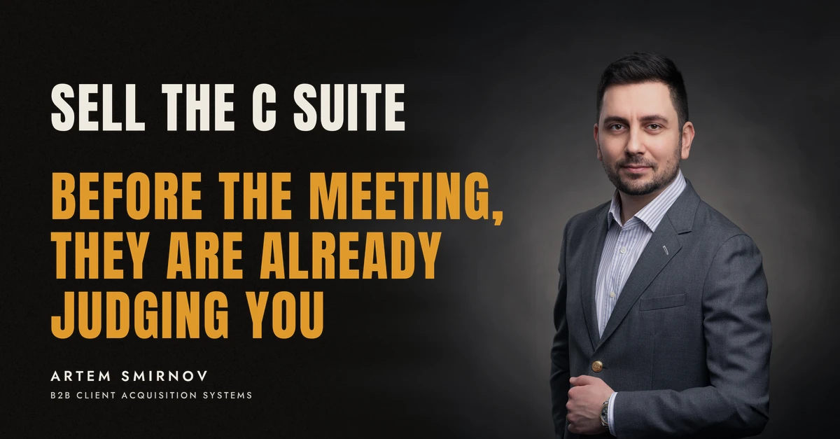 Artem Smirnov in a dark suit against a charcoal studio backdrop, next to the line 'SELL THE C SUITE. Before the meeting, they are already judging you'